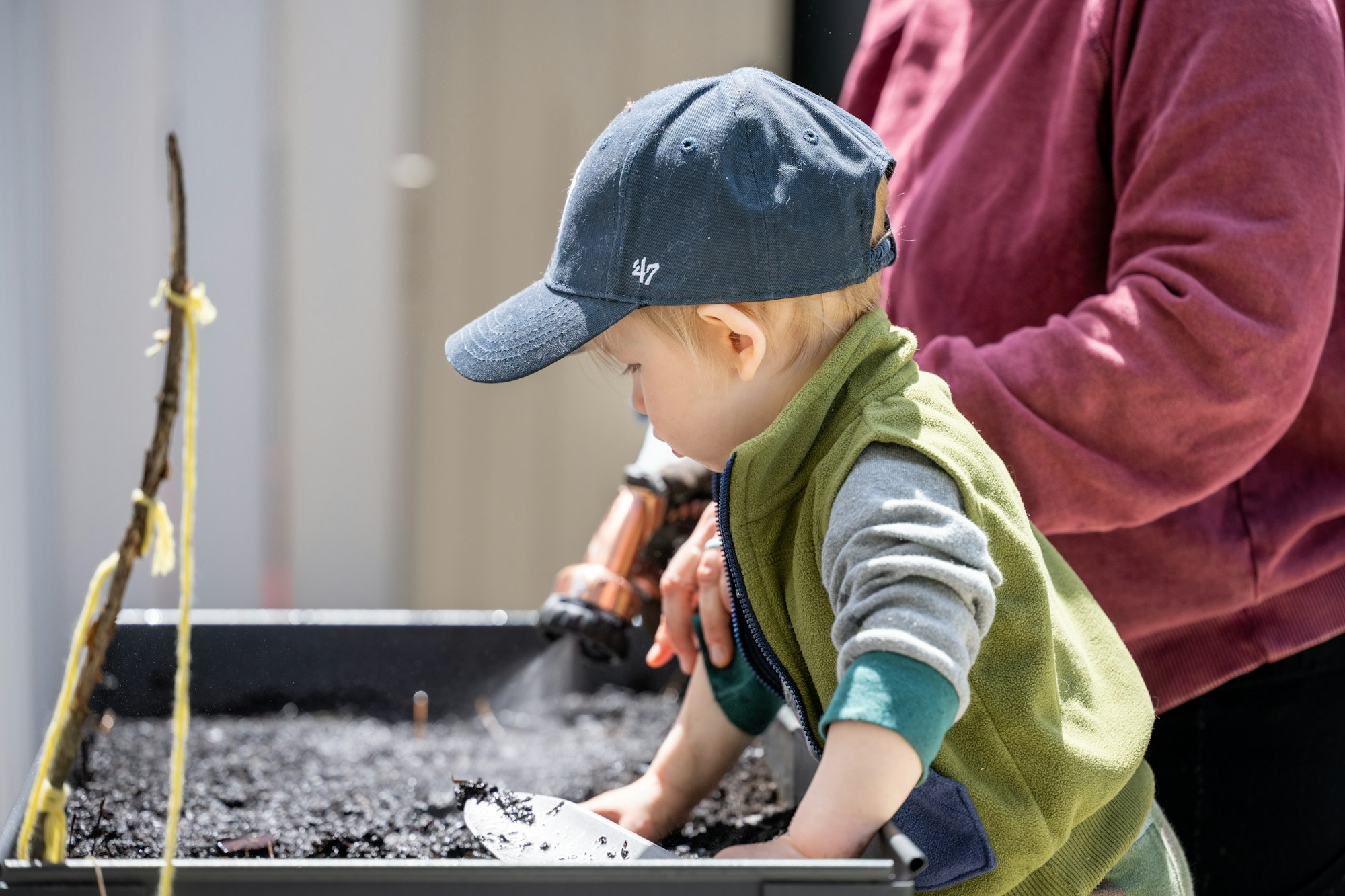 A parent and child learning and playing together